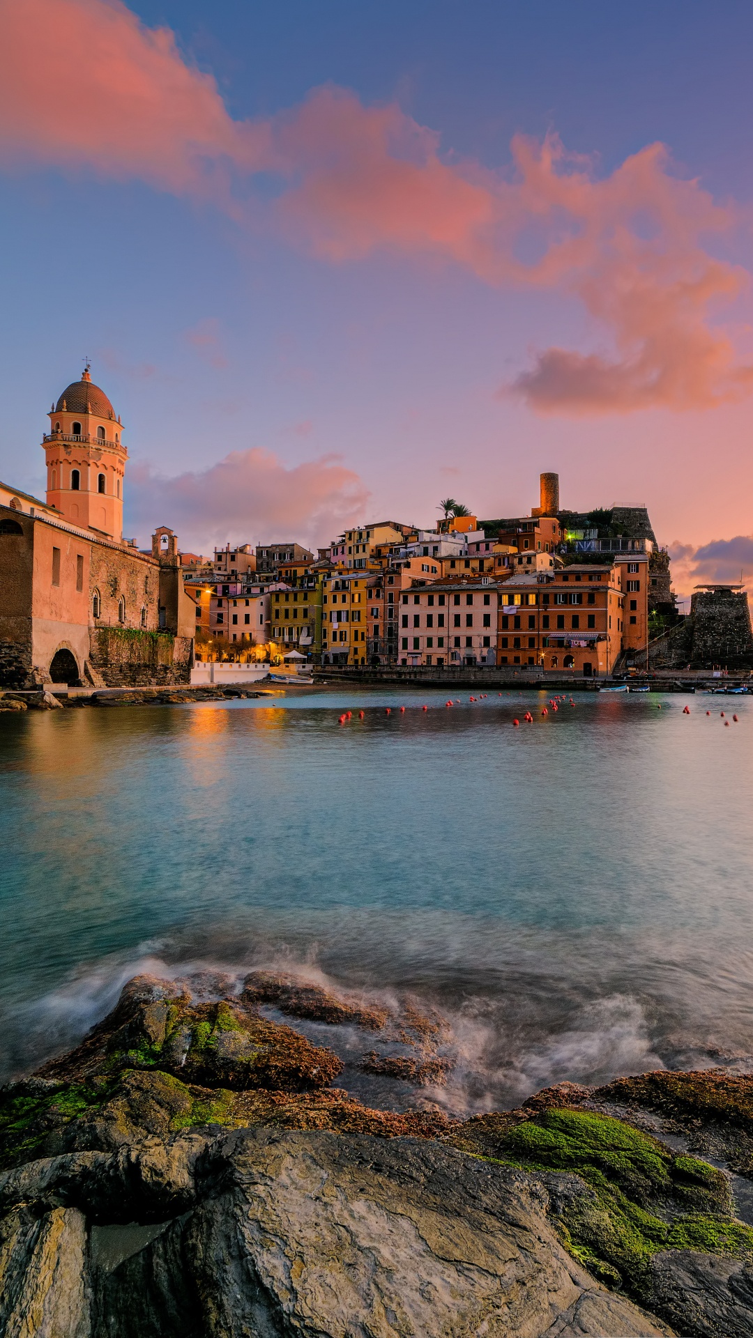 Brown Concrete Building Near Body of Water During Sunset. Wallpaper in 1080x1920 Resolution