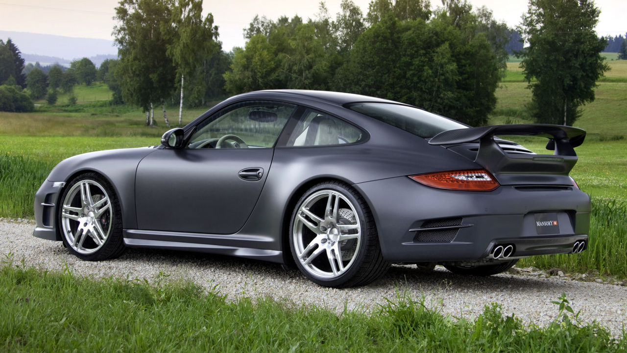 Black Porsche 911 on Green Grass Field During Daytime. Wallpaper in 1280x720 Resolution