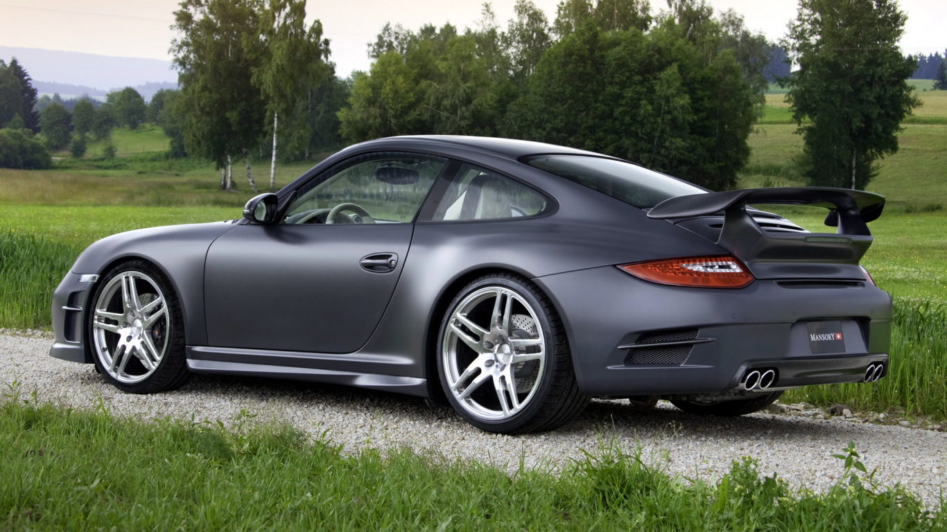 Porsche 911 Noire Sur Terrain D'herbe Verte Pendant la Journée. Wallpaper in 1366x768 Resolution