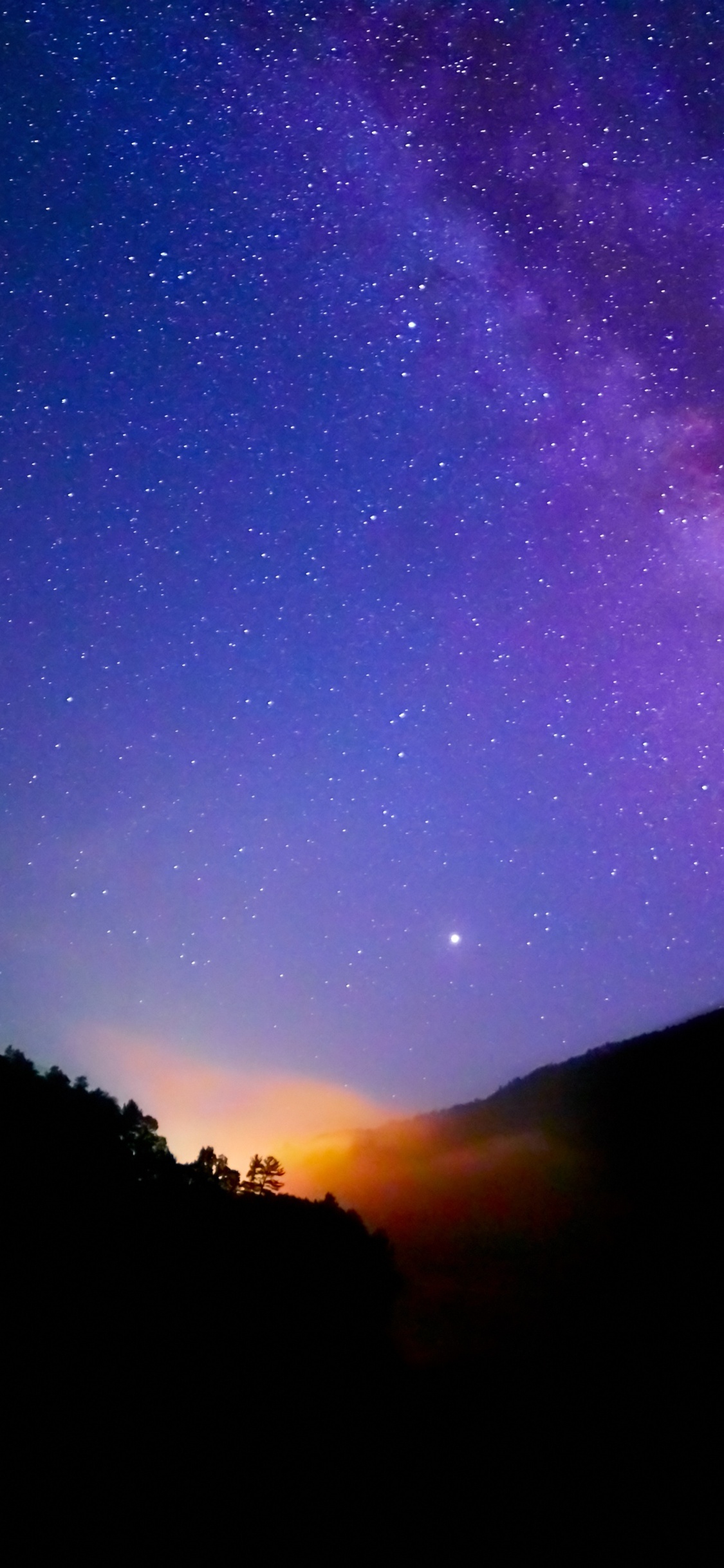 Silhouette of Mountain Under Starry Night. Wallpaper in 1125x2436 Resolution