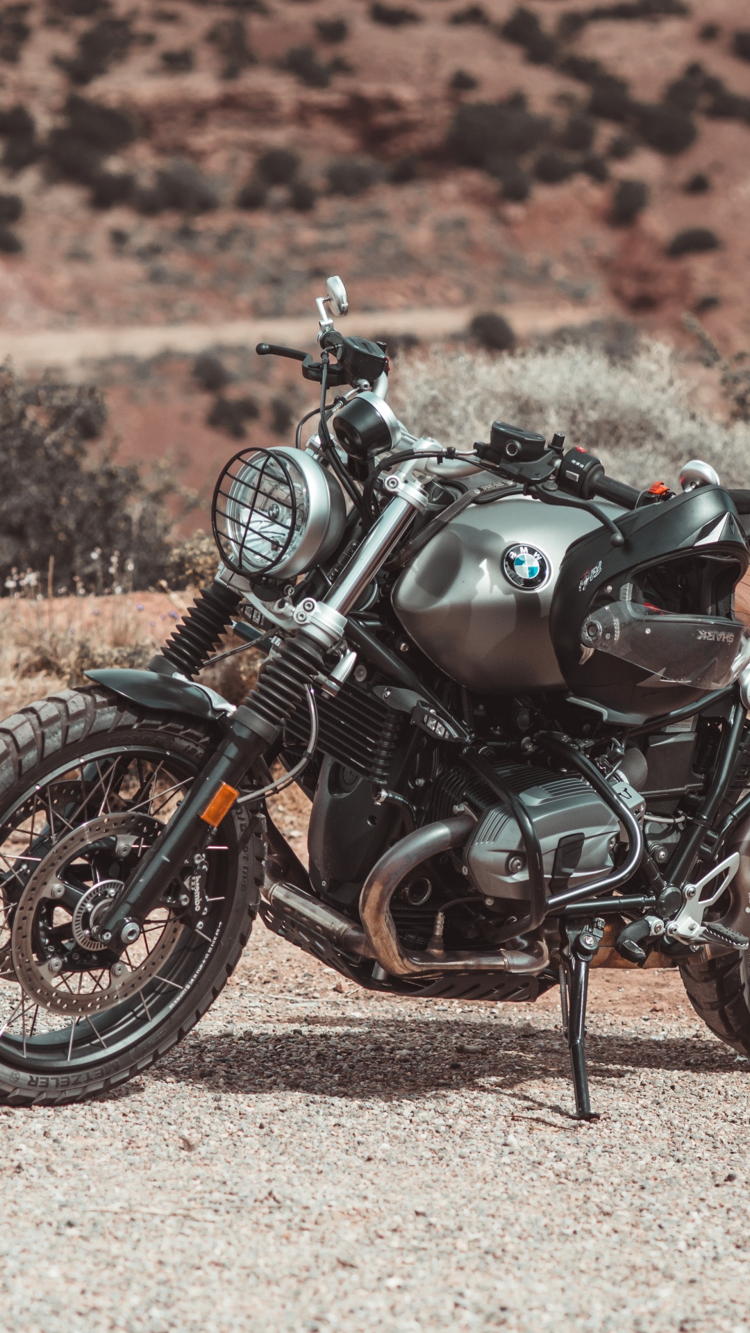 Black and Brown Motorcycle on Brown Sand During Daytime. Wallpaper in 1080x1920 Resolution