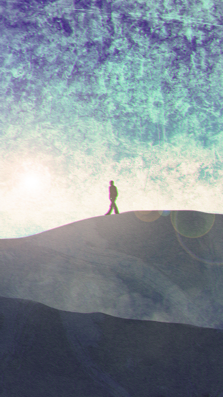 Person Standing on Green Grass Field. Wallpaper in 750x1334 Resolution