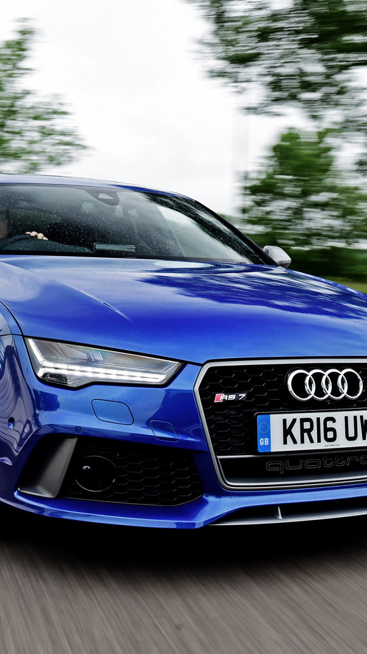 Blauer Audi r 8 Tagsüber Unterwegs. Wallpaper in 750x1334 Resolution