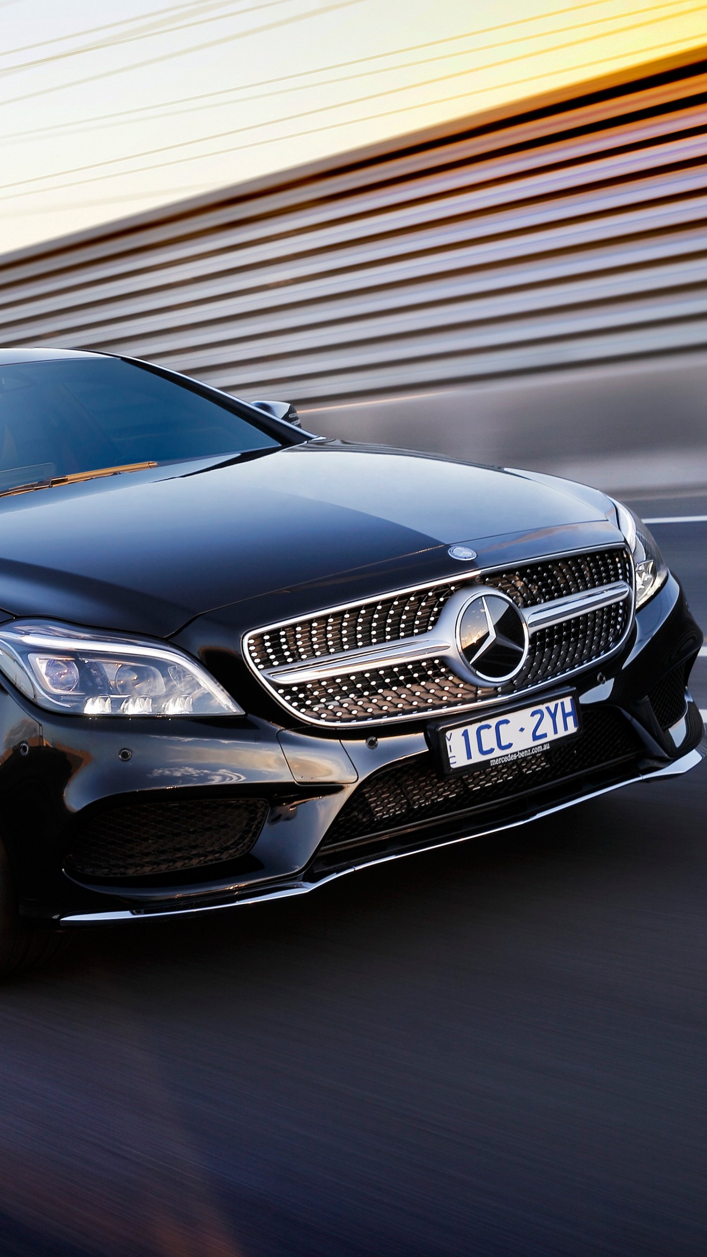 Brown Mercedes Benz Coupe on Road. Wallpaper in 1440x2560 Resolution