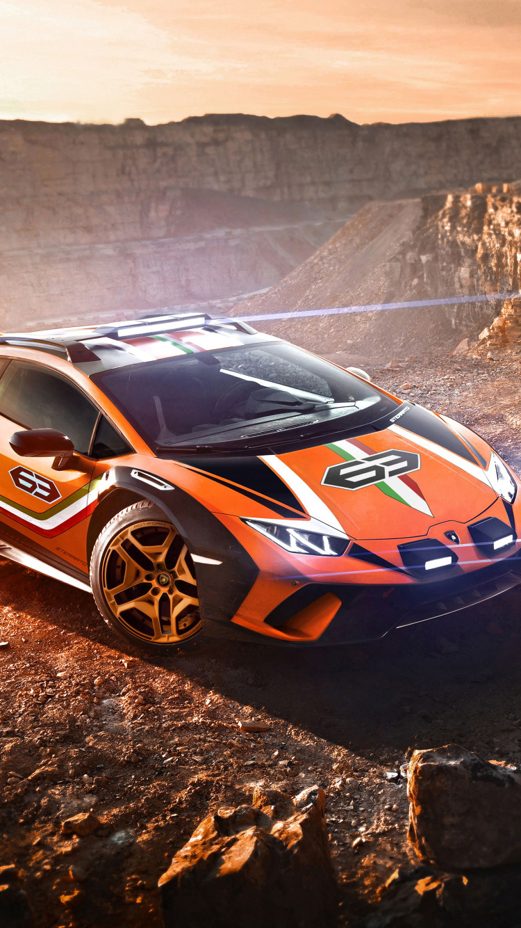 Blau-weißer Porsche 911 Auf Braunem Rocky Mountain Tagsüber. Wallpaper in 750x1334 Resolution