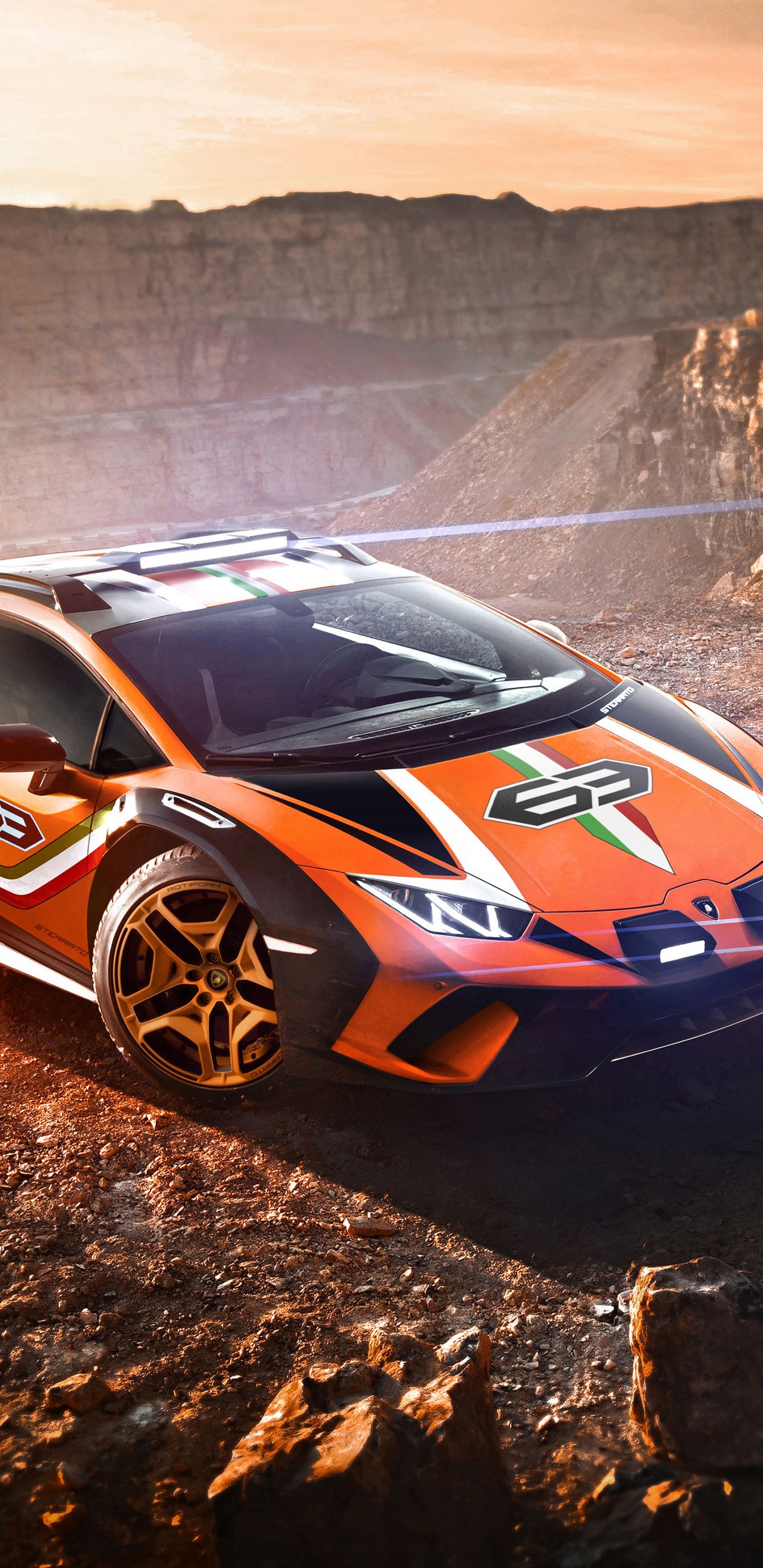 Blue and White Porsche 911 on Brown Rocky Mountain During Daytime. Wallpaper in 1440x2960 Resolution