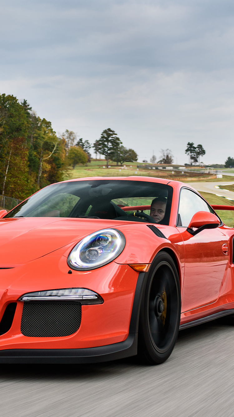 Red Ferrari 458 Italia on Road During Daytime. Wallpaper in 750x1334 Resolution