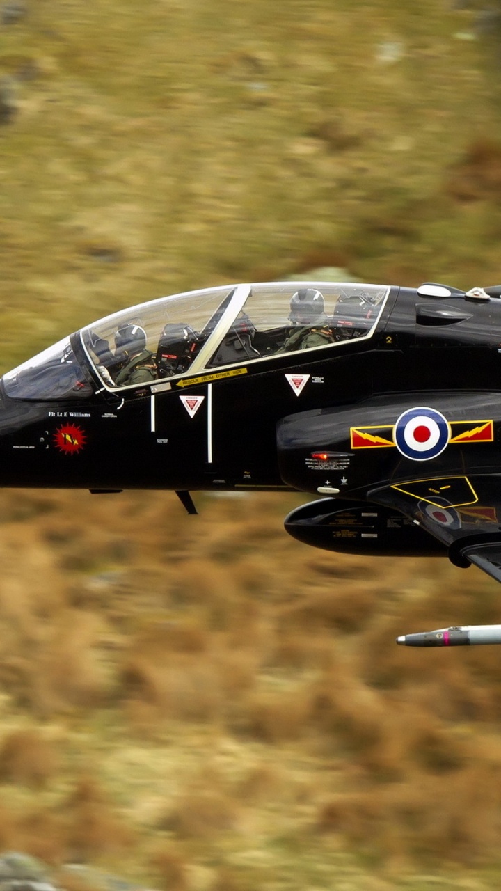 Black and Yellow Fighter Jet Flying Over Green Trees During Daytime. Wallpaper in 720x1280 Resolution