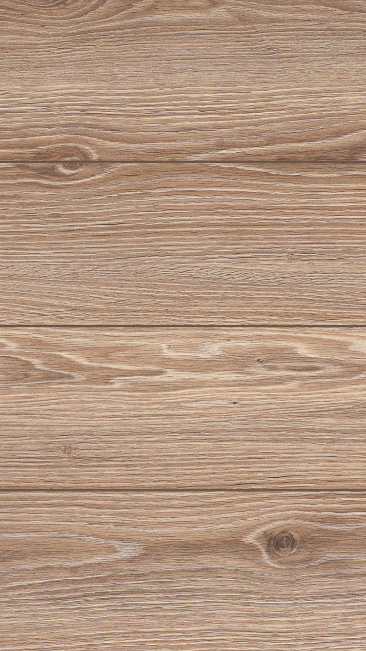 Brown Wooden Surface With White and Black Textile. Wallpaper in 750x1334 Resolution