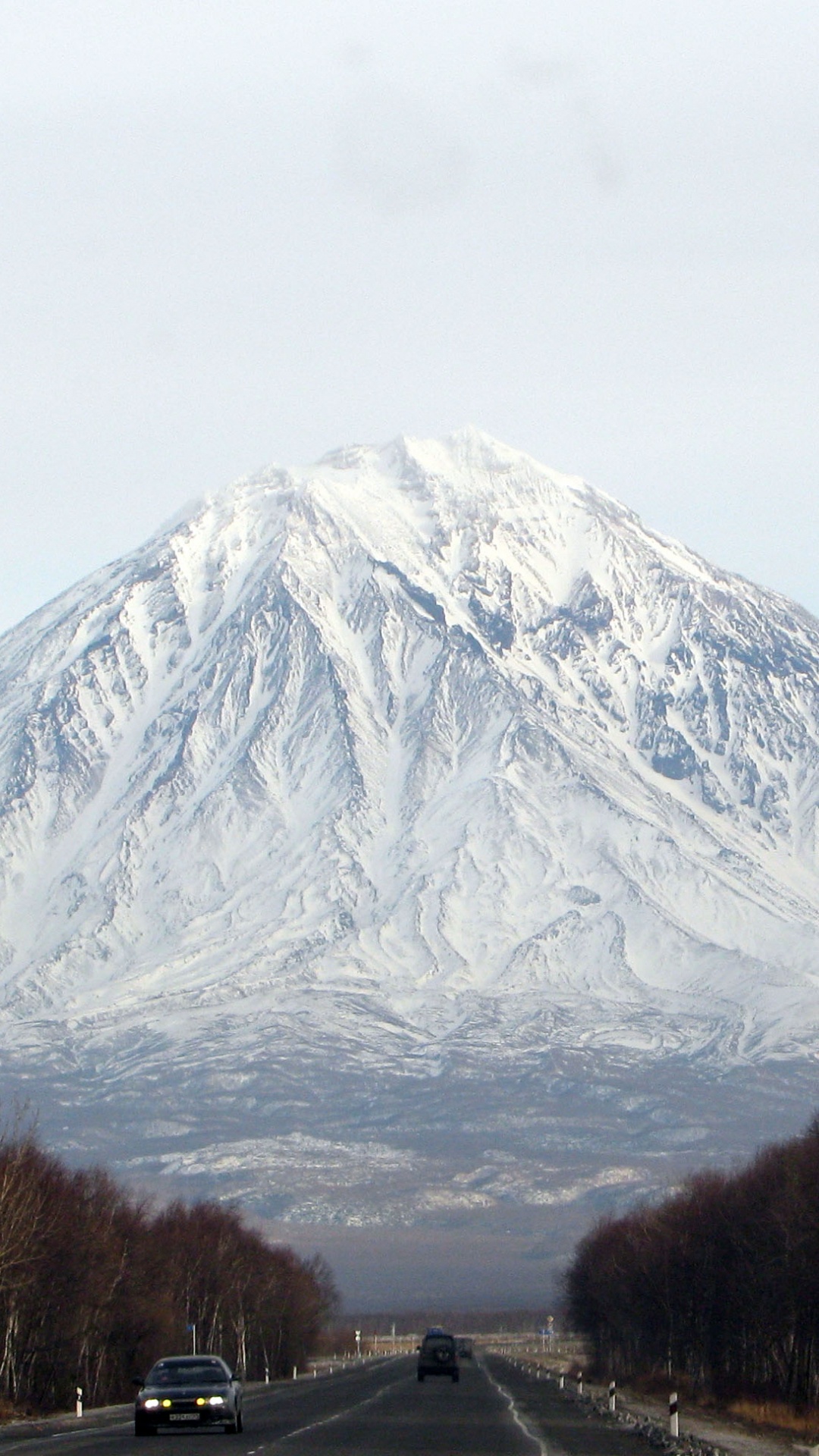 Snow Covered Mountain Under Cloudy Sky During Daytime. Wallpaper in 1080x1920 Resolution