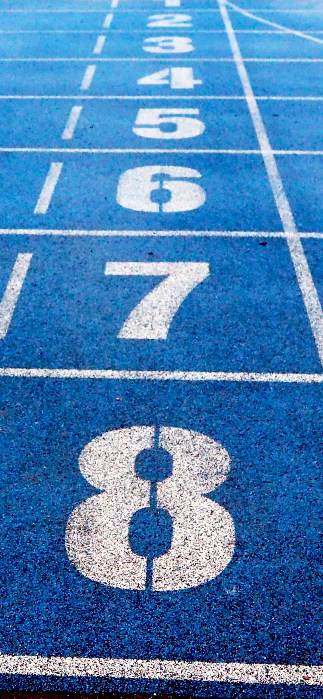 Alfombra Marrón y Blanca. Wallpaper in 1125x2436 Resolution