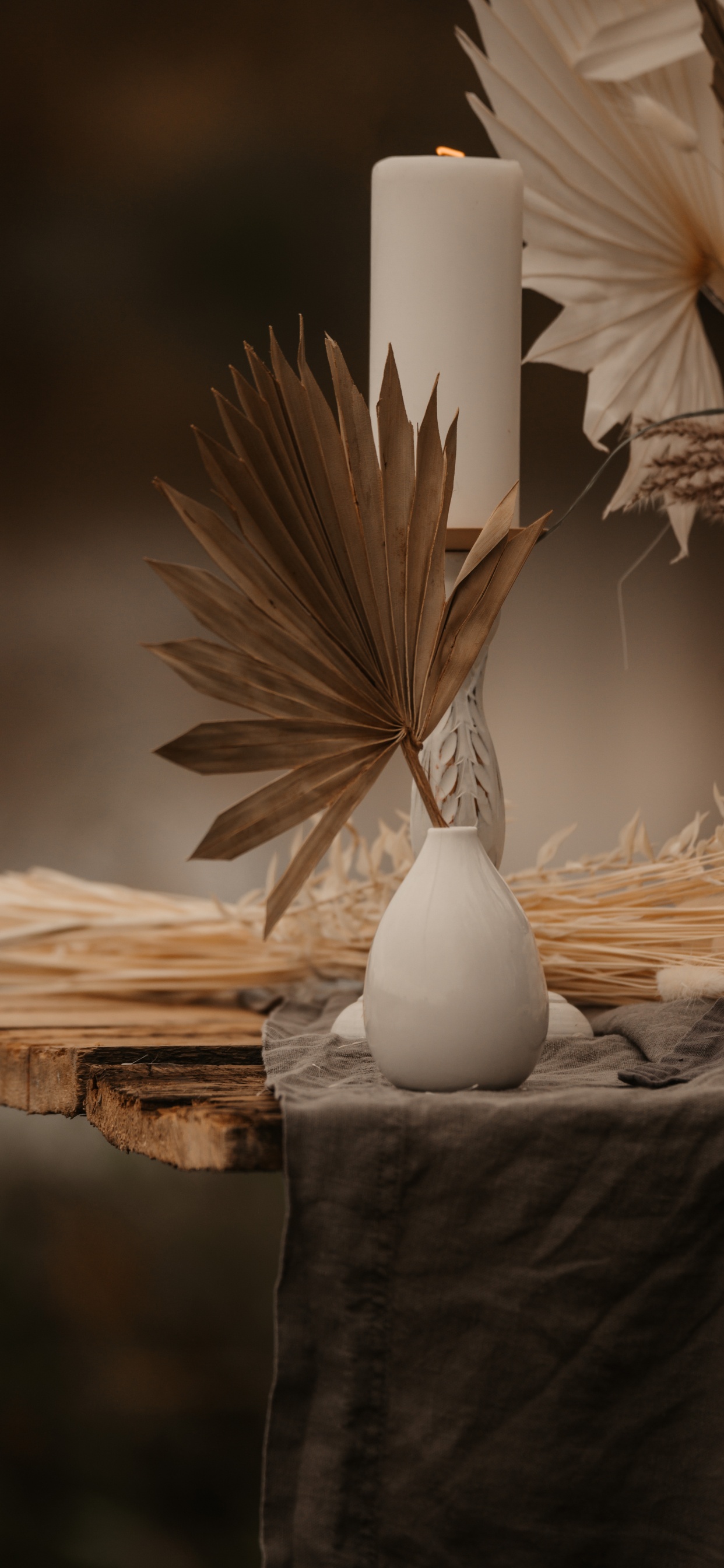 White Pillar Candle on Brown Wooden Table. Wallpaper in 1242x2688 Resolution