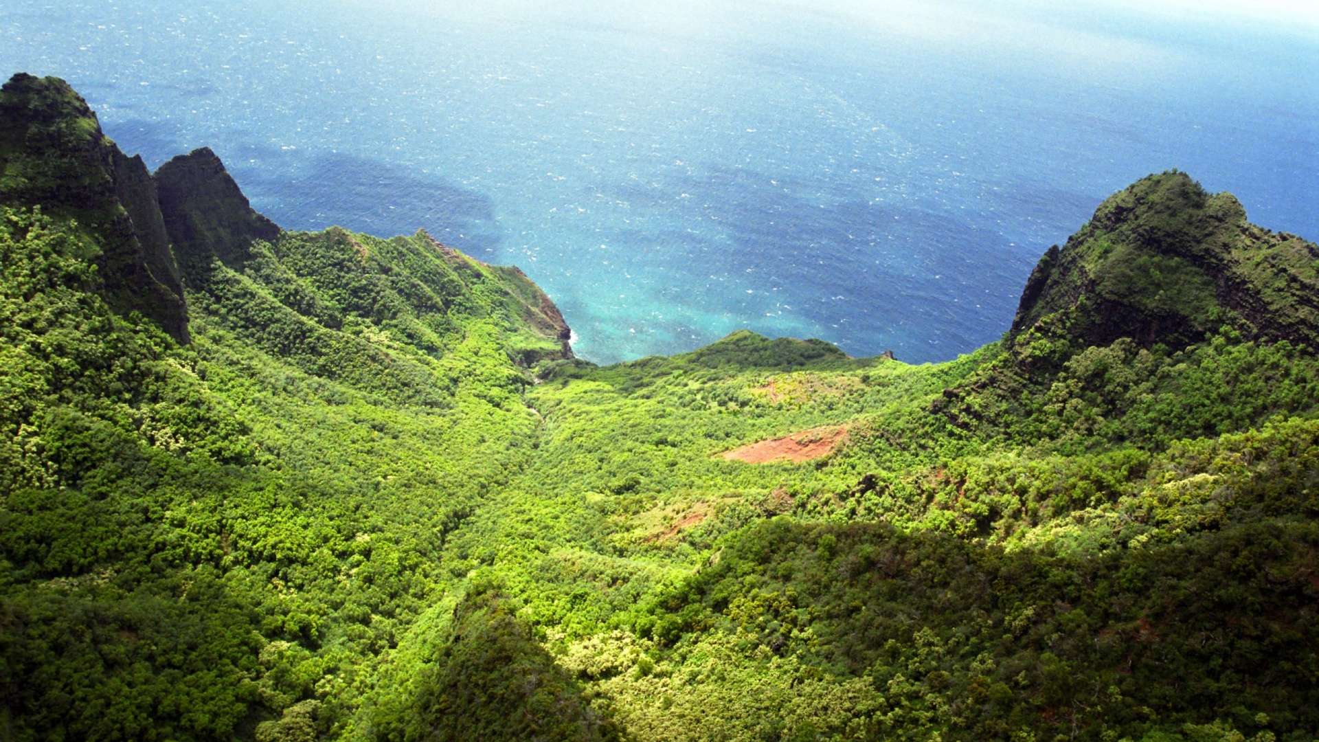 Green Mountain Beside Body of Water During Daytime. Wallpaper in 1920x1080 Resolution