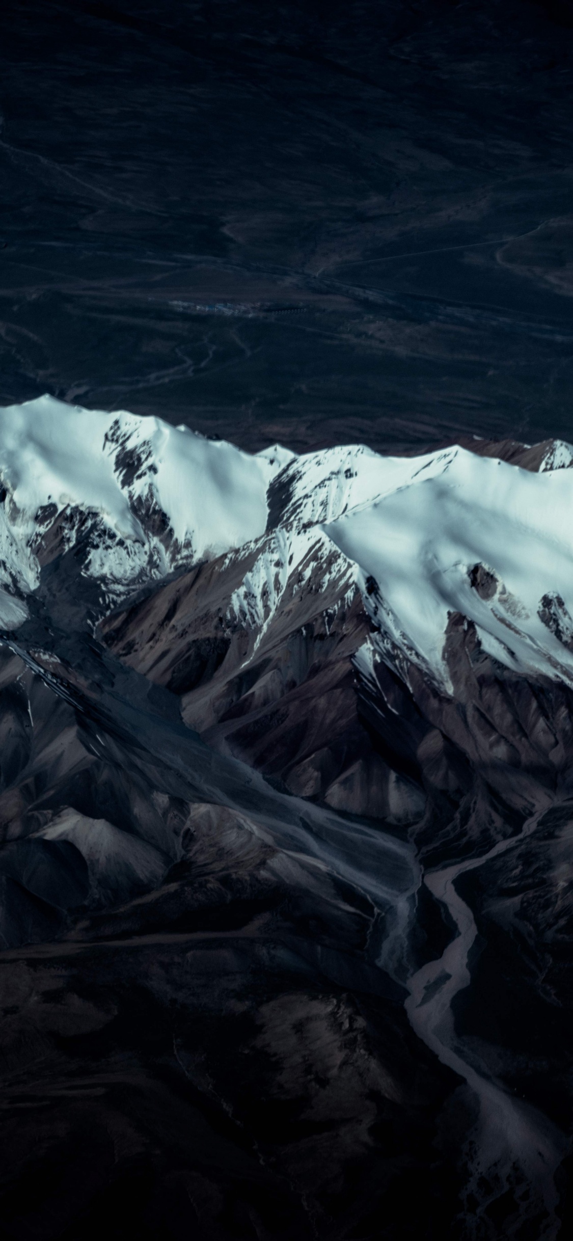 Snow Covered Mountain During Daytime. Wallpaper in 1125x2436 Resolution