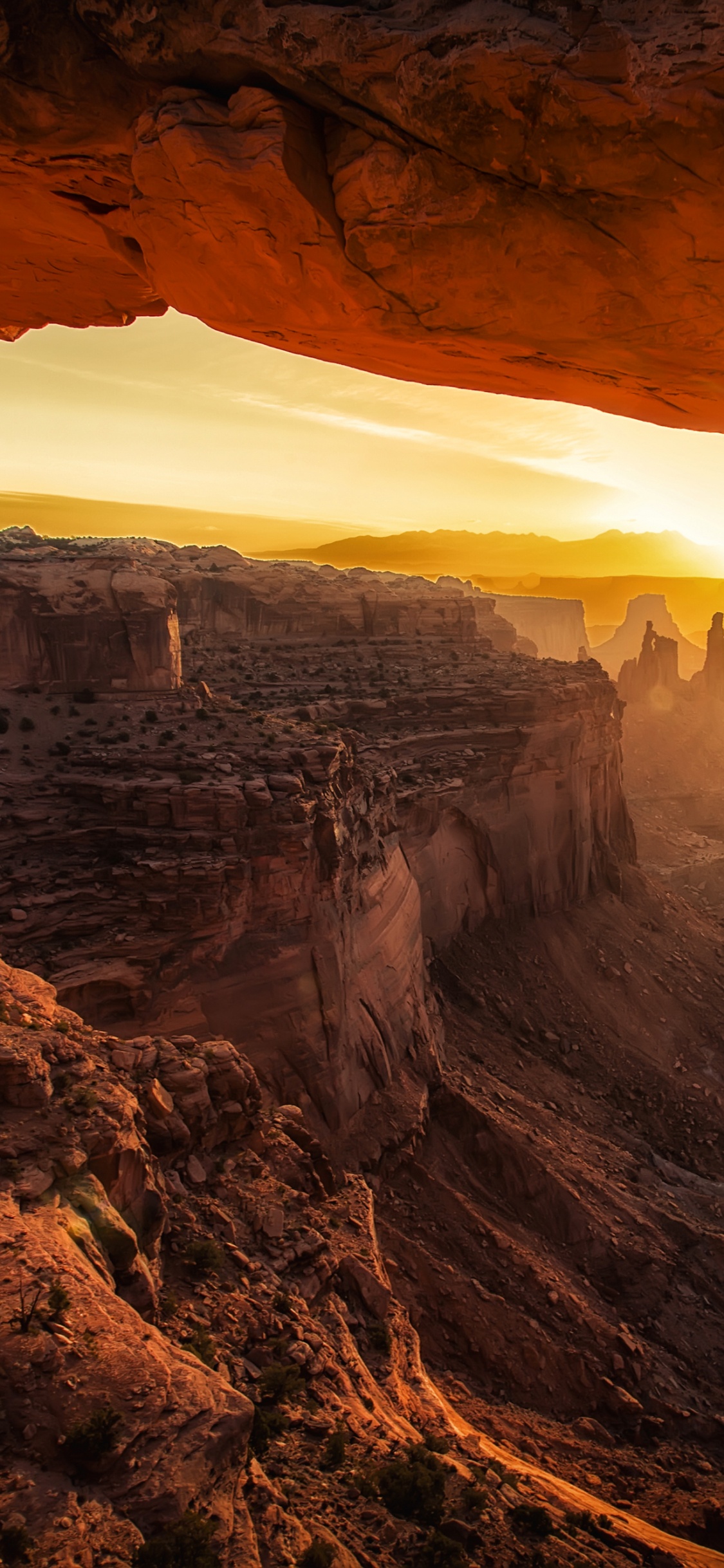 Brown Rock Formation During Daytime. Wallpaper in 1125x2436 Resolution