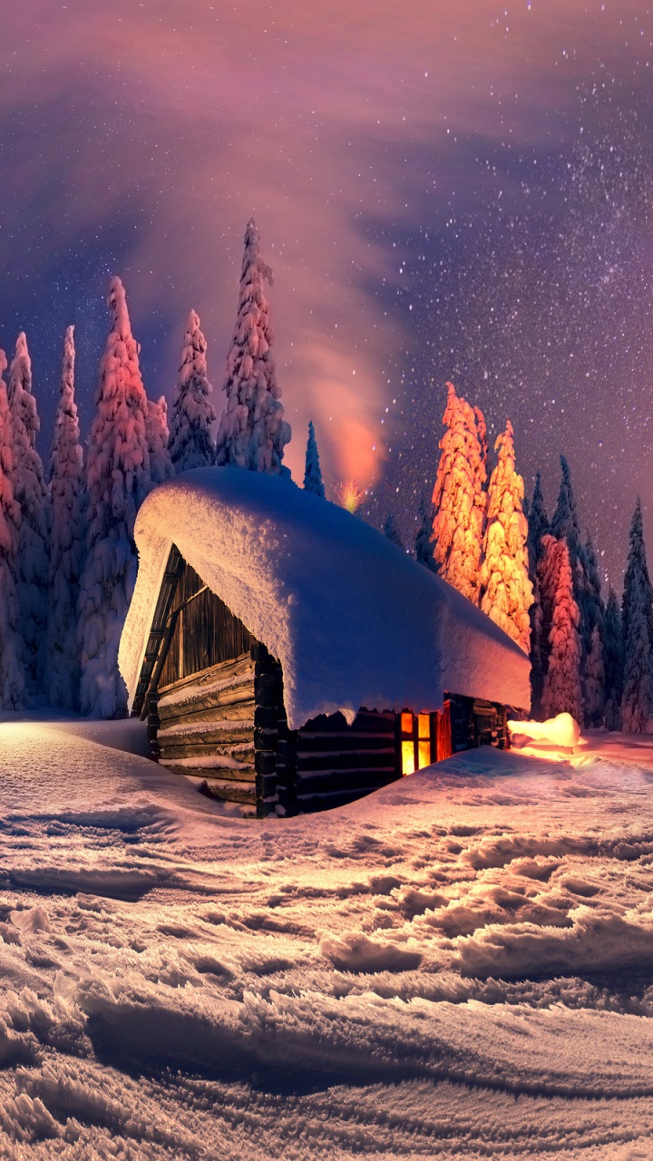 Brown Wooden House on Snow Covered Ground During Night Time. Wallpaper in 720x1280 Resolution