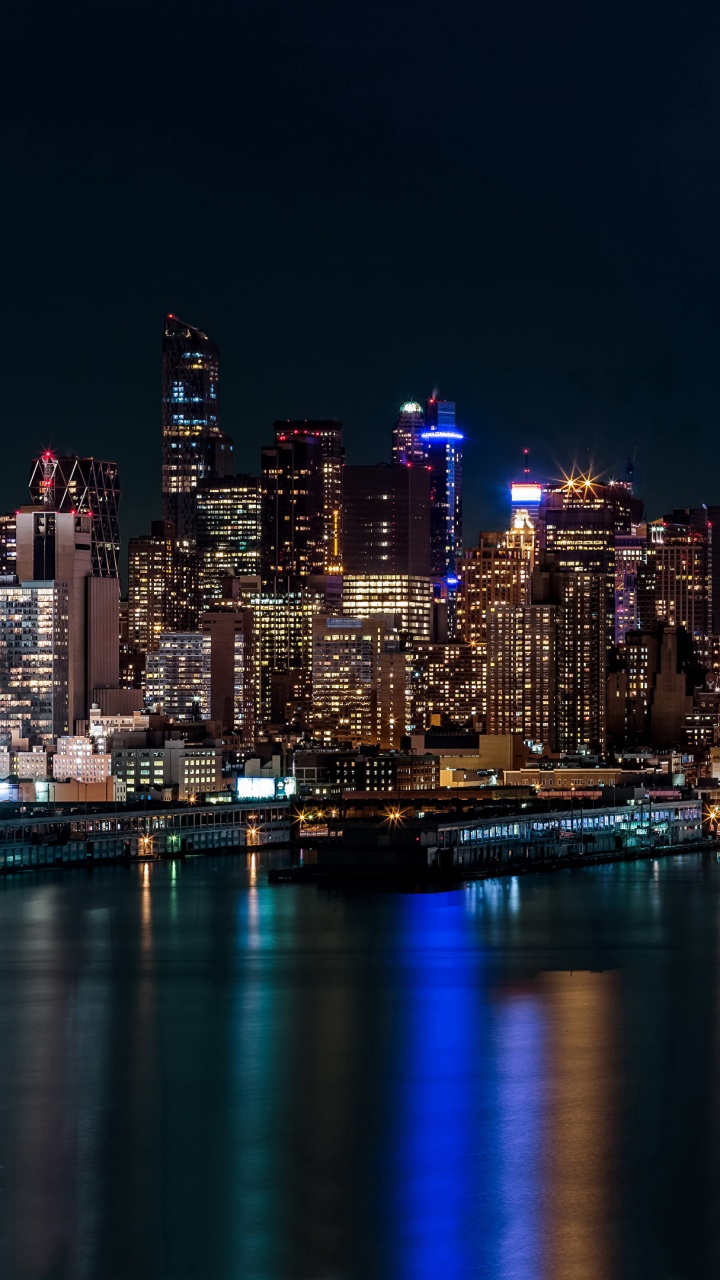 City Skyline During Night Time. Wallpaper in 720x1280 Resolution