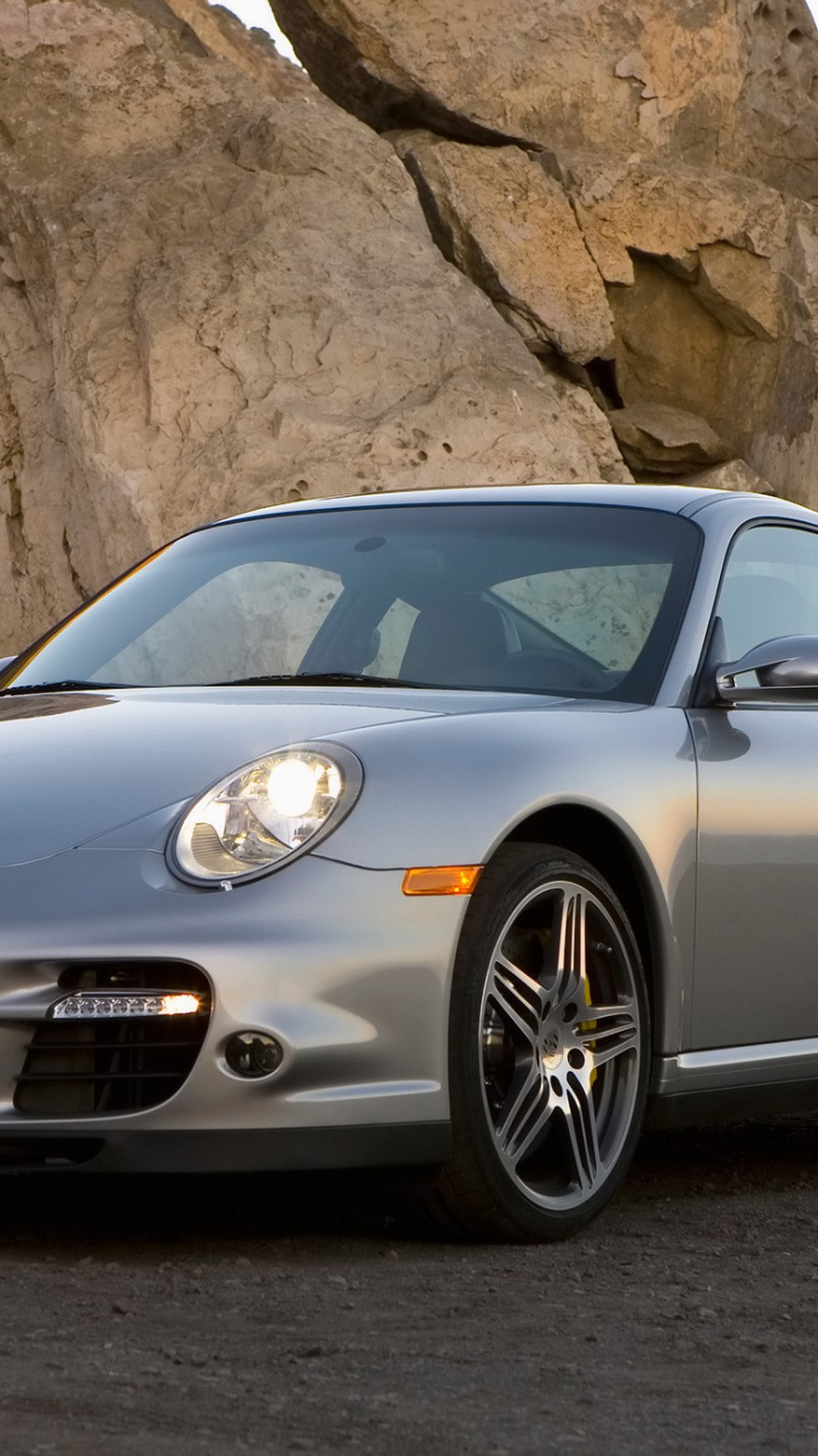 Silver Mercedes Benz Coupe Estacionado Cerca de la Formación Rocosa Marrón Durante el Día. Wallpaper in 750x1334 Resolution