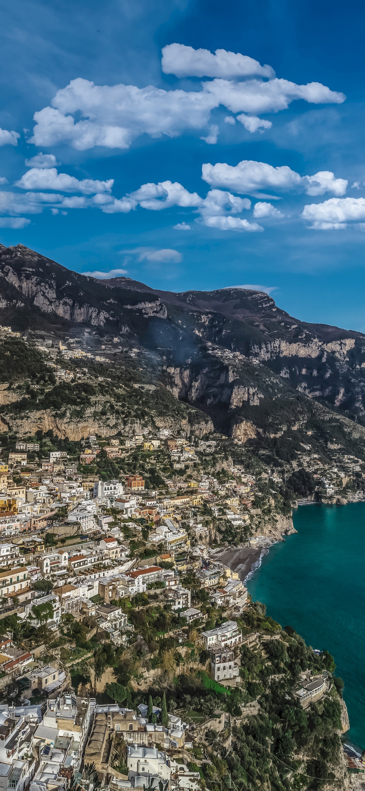 Aerial View of City Near Body of Water During Daytime. Wallpaper in 1242x2688 Resolution