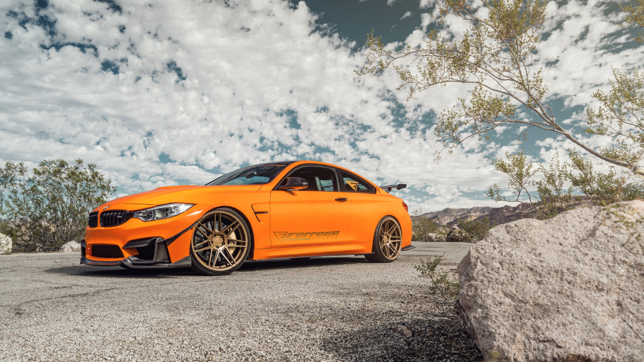 Porsche 911 Orange Sur Rocher Gris Sous Des Nuages Blancs Pendant la Journée. Wallpaper in 1280x720 Resolution