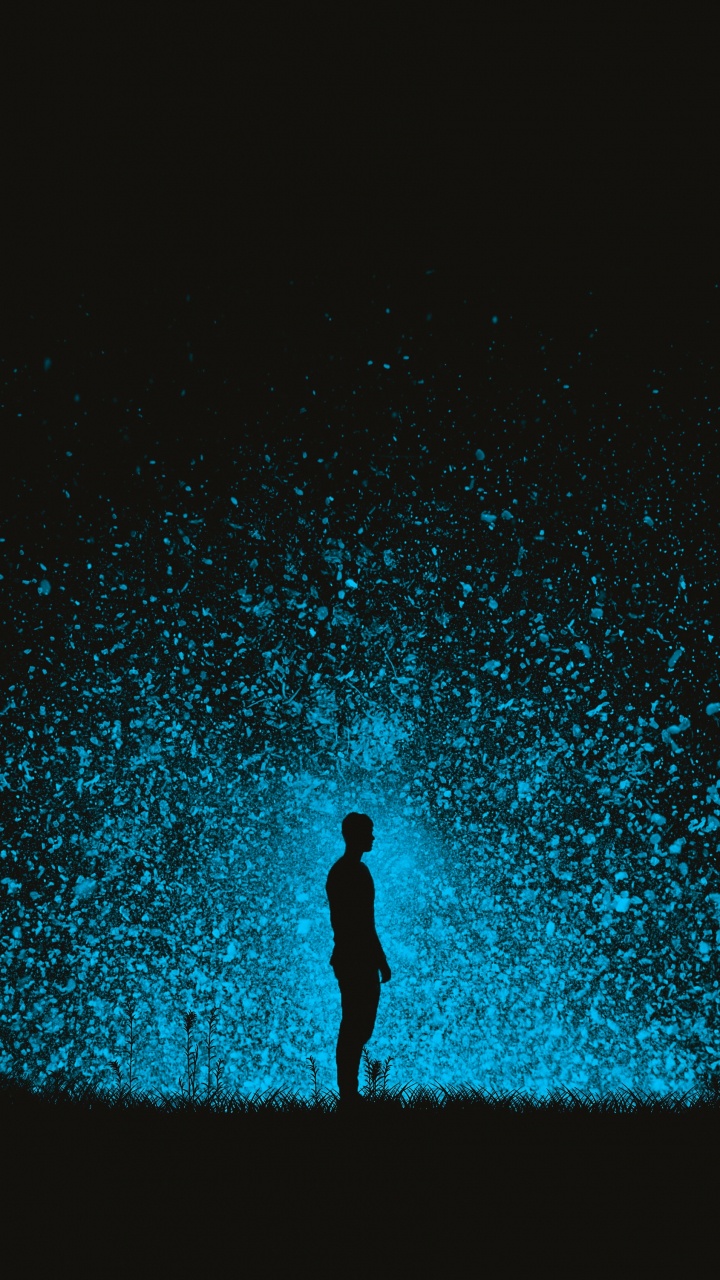 Silhouette of Person Standing on The Ground With Blue Lights. Wallpaper in 720x1280 Resolution