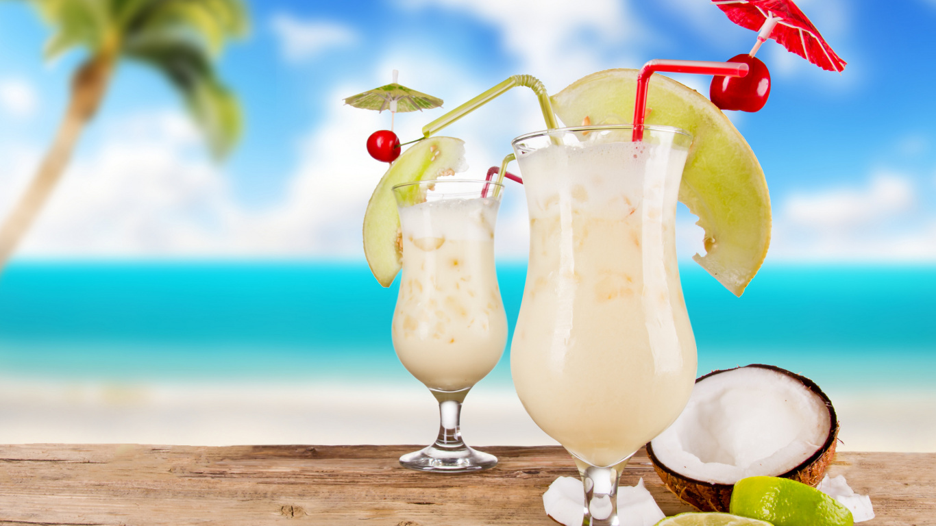 Two Clear Wine Glasses With Yellow Liquid. Wallpaper in 1366x768 Resolution