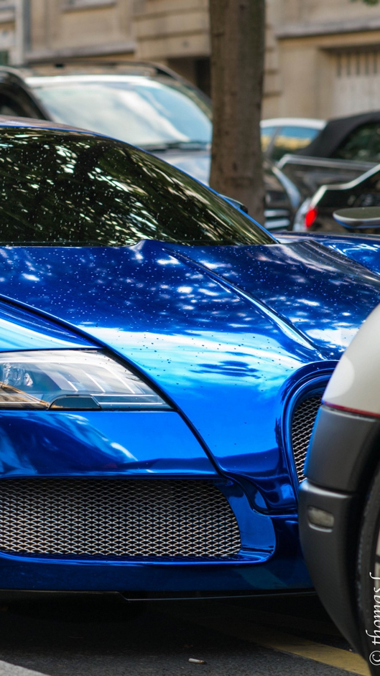 Blaues Bmw m 3 Coupe Tagsüber Auf Der Straße Geparkt. Wallpaper in 750x1334 Resolution