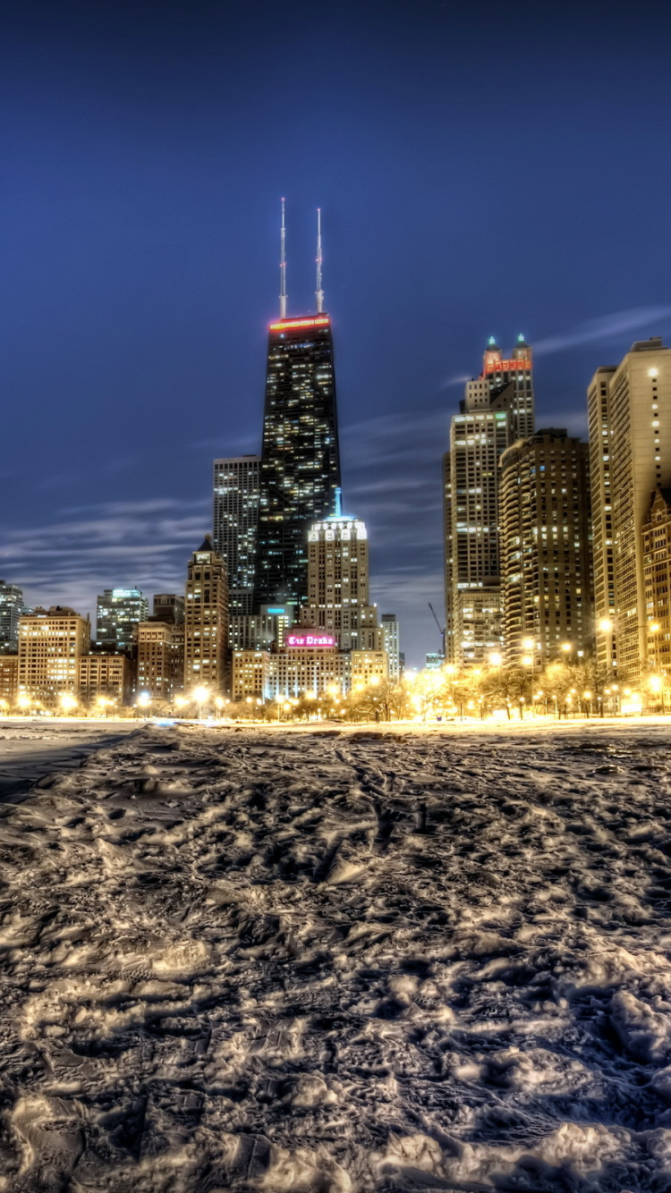 City Skyline During Night Time. Wallpaper in 750x1334 Resolution