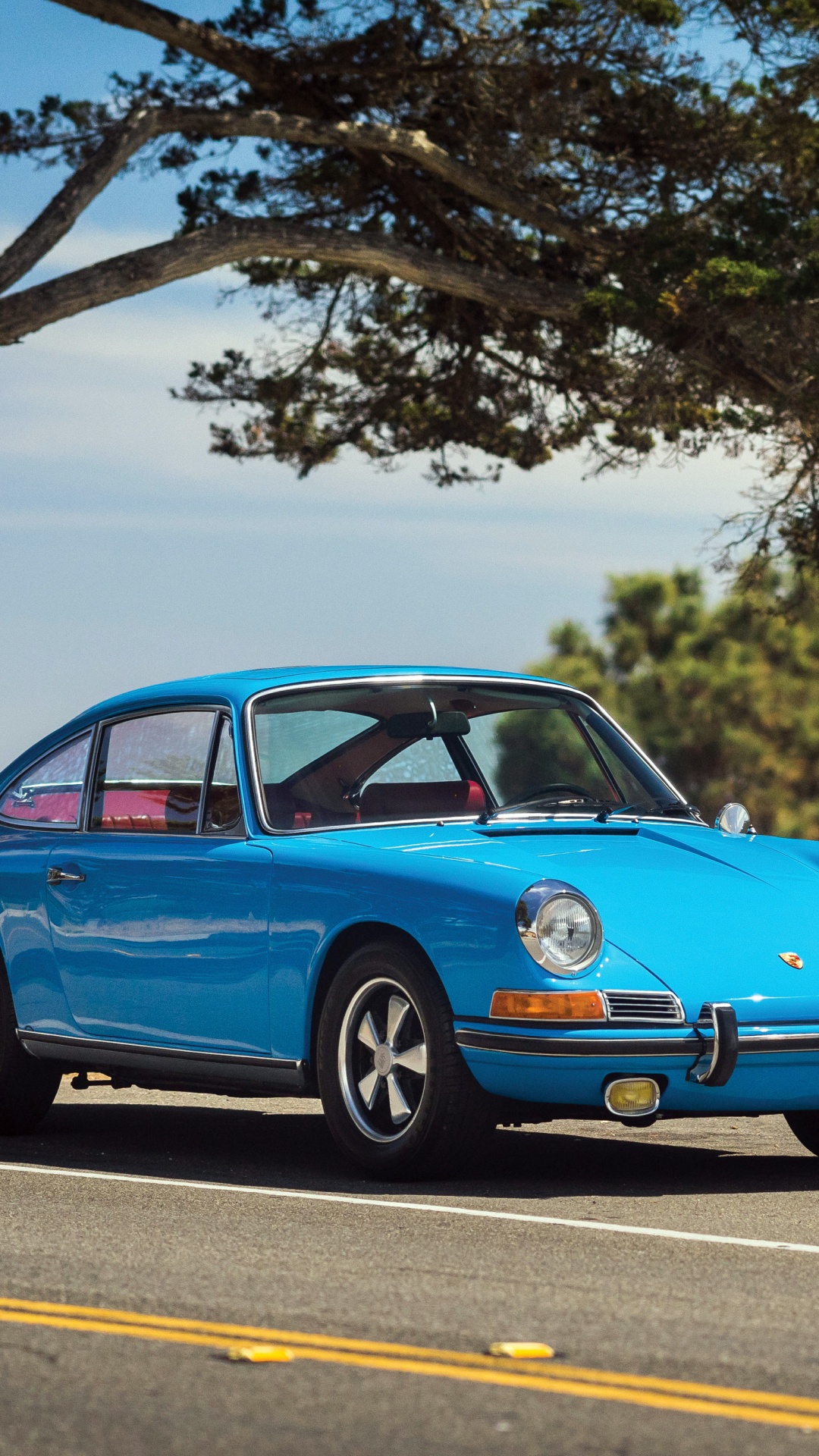 Blue Porsche 911 Parked on Road During Daytime. Wallpaper in 1080x1920 Resolution