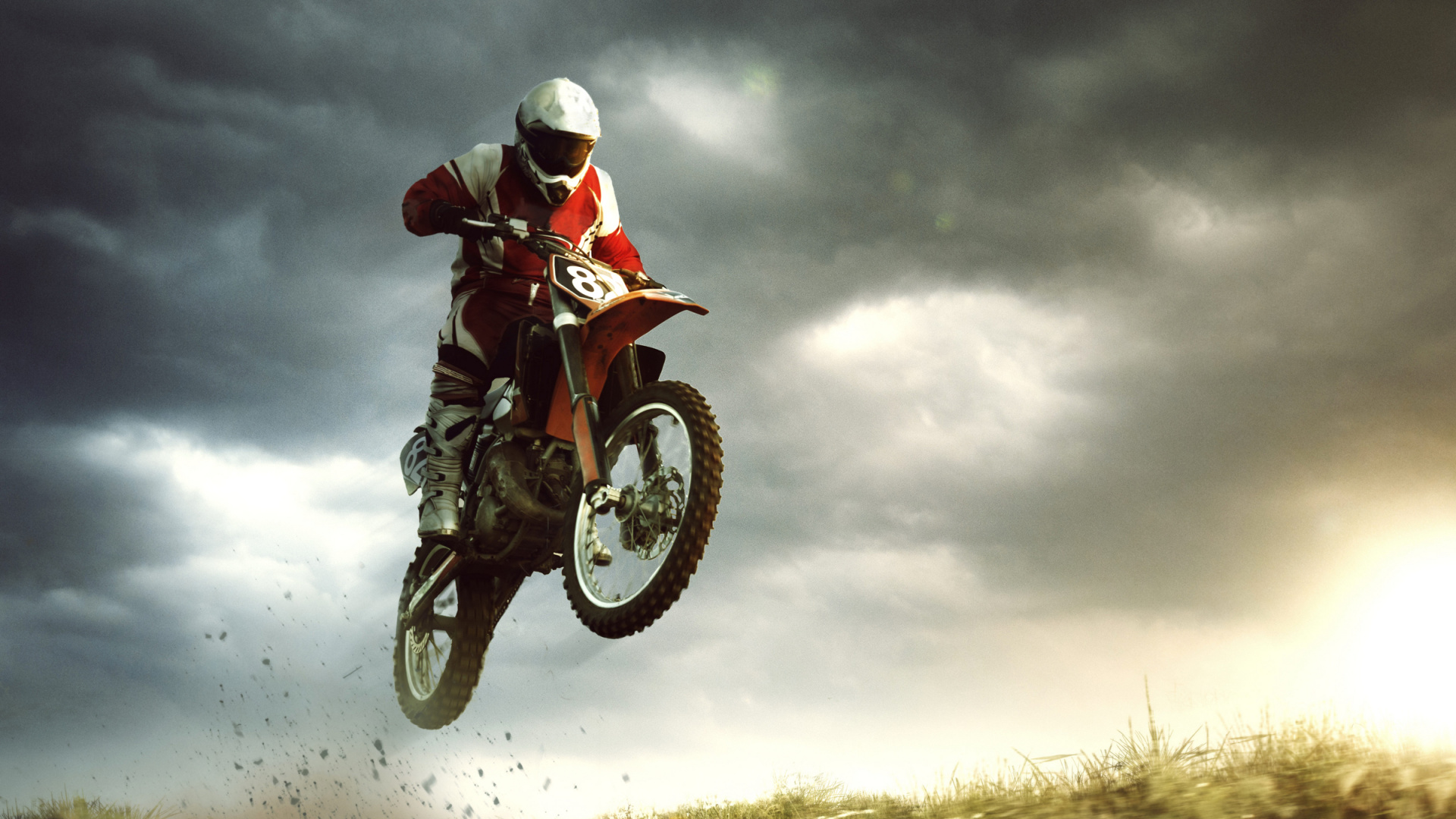 Man in Red and White Motocross Suit Riding Motocross Dirt Bike. Wallpaper in 1920x1080 Resolution
