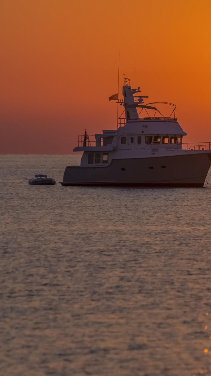 White and Black Ship on Sea During Sunset. Wallpaper in 720x1280 Resolution