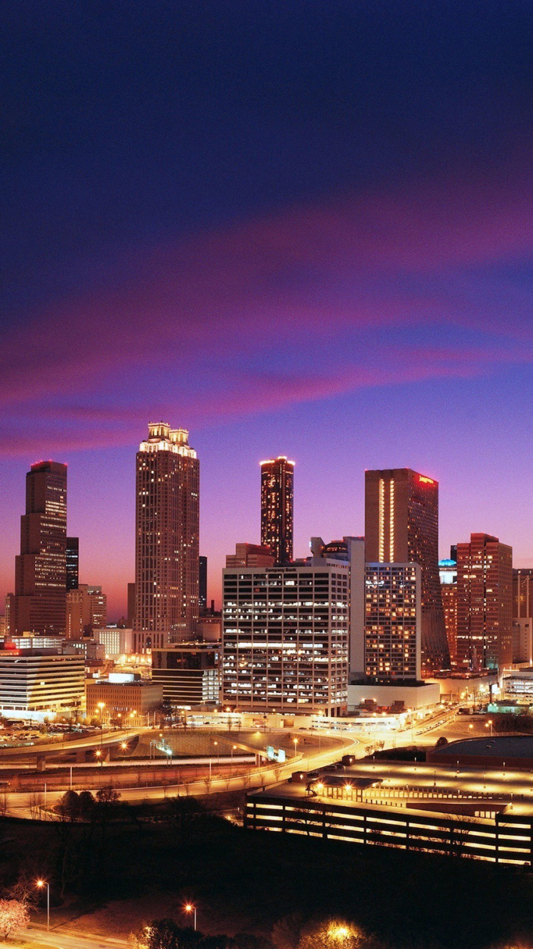 City Skyline During Night Time. Wallpaper in 750x1334 Resolution