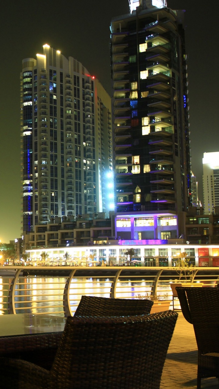 City Skyline During Night Time. Wallpaper in 720x1280 Resolution