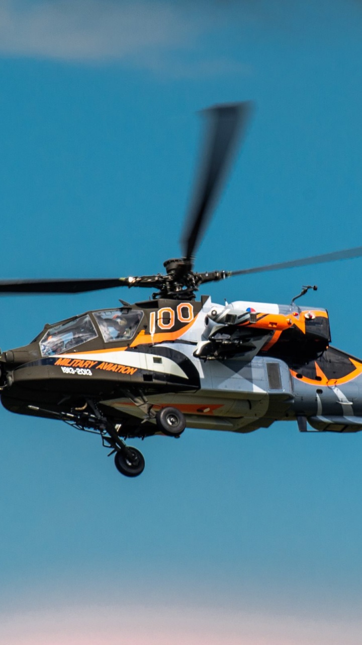 Orange and Black Helicopter Flying in The Sky. Wallpaper in 720x1280 Resolution