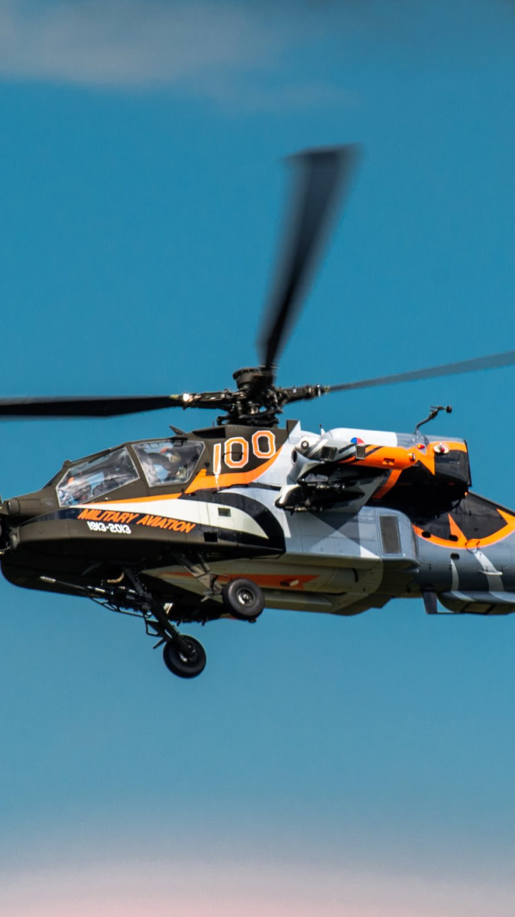 Orange and Black Helicopter Flying in The Sky. Wallpaper in 750x1334 Resolution