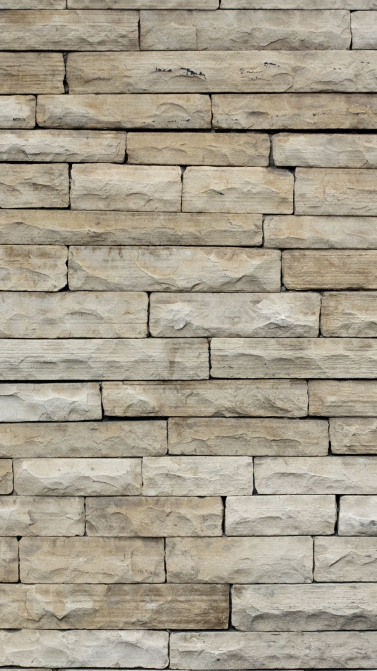 Braune Und Beige Backsteinmauer. Wallpaper in 750x1334 Resolution