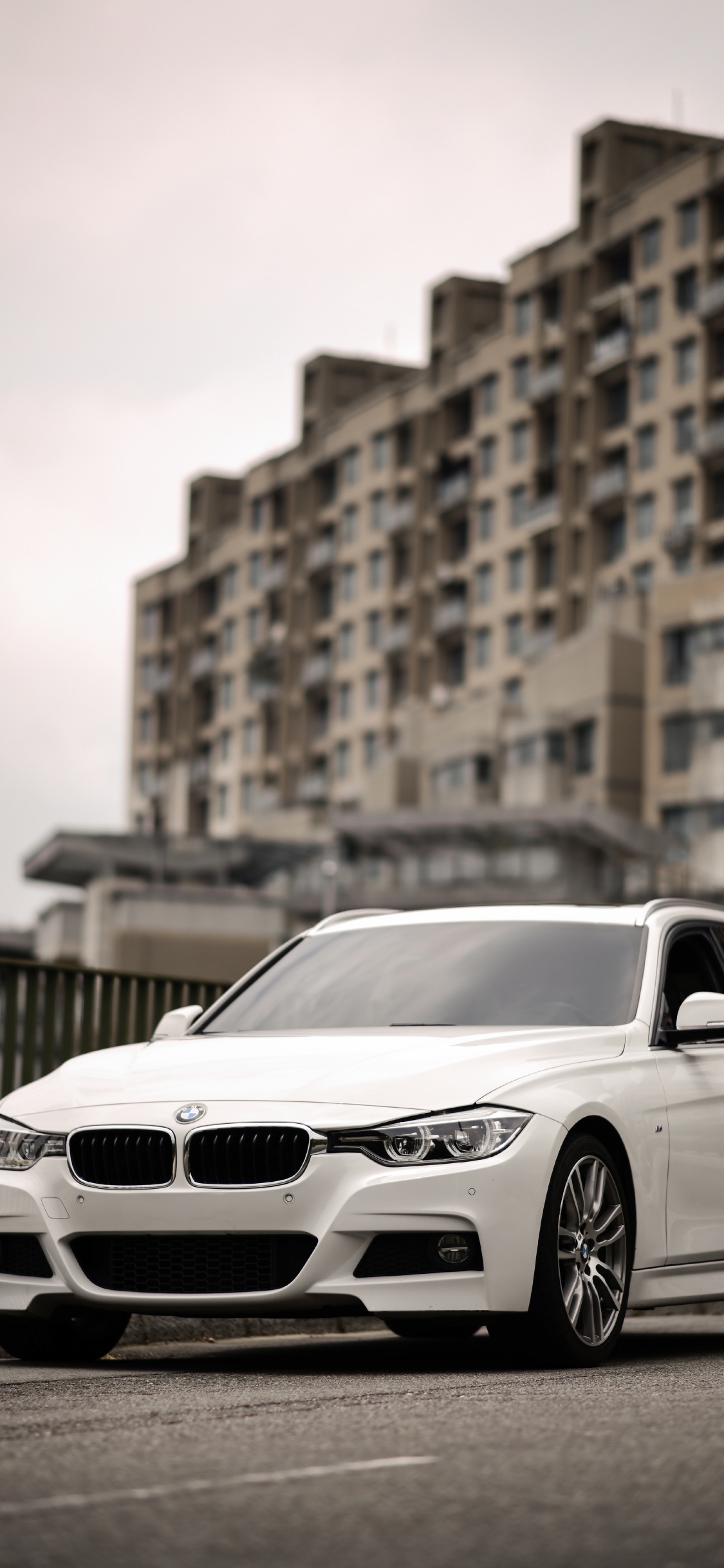 White Mercedes Benz Coupe on Road During Daytime. Wallpaper in 1125x2436 Resolution