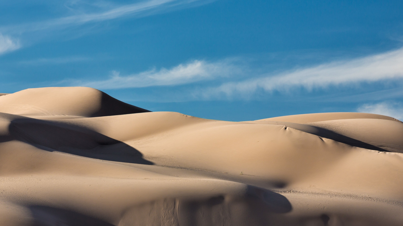 White Sand Under Blue Sky During Daytime. Wallpaper in 1366x768 Resolution