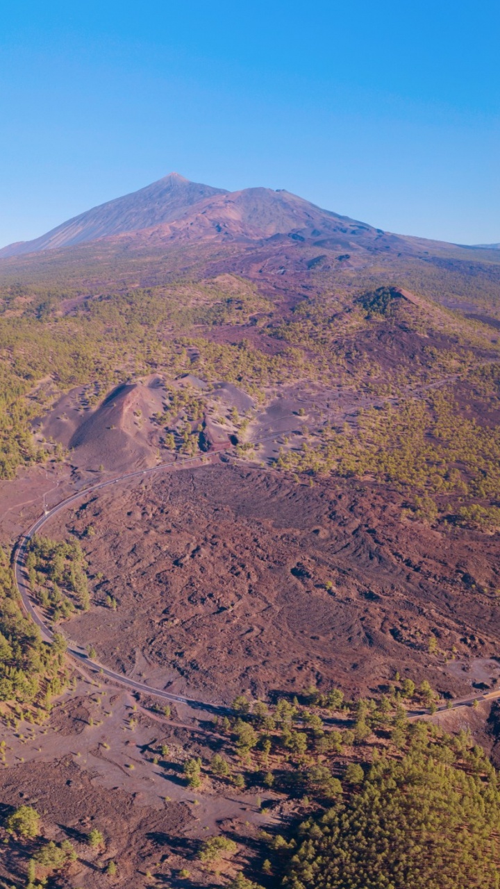 Green and Brown Mountains Under Blue Sky During Daytime. Wallpaper in 720x1280 Resolution
