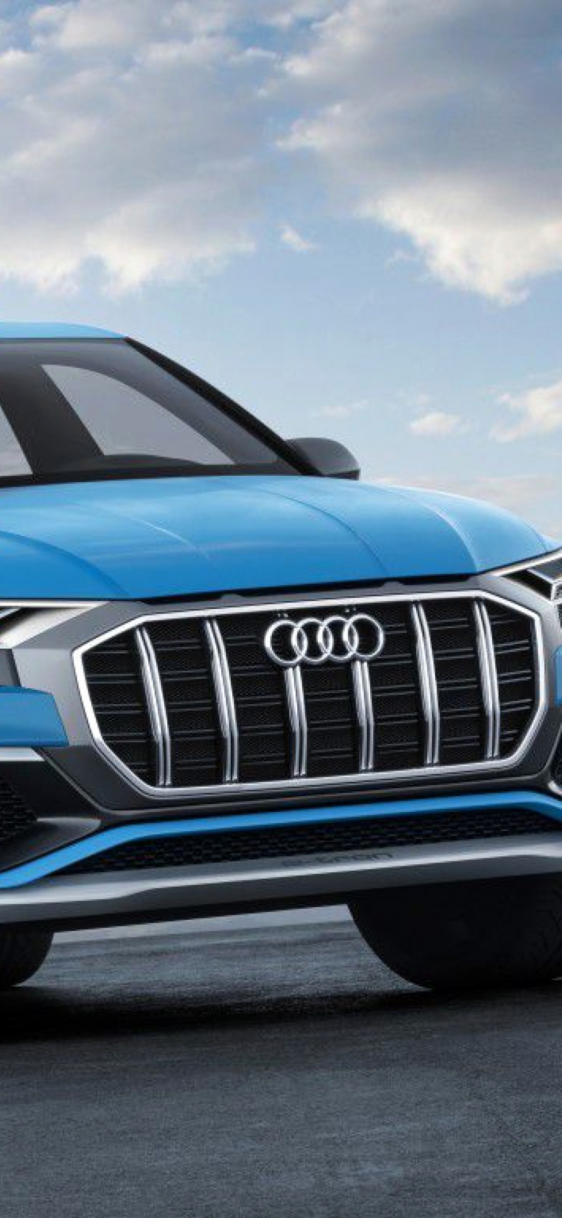 Audi a 4 Azul en la Carretera Durante el Día. Wallpaper in 1125x2436 Resolution