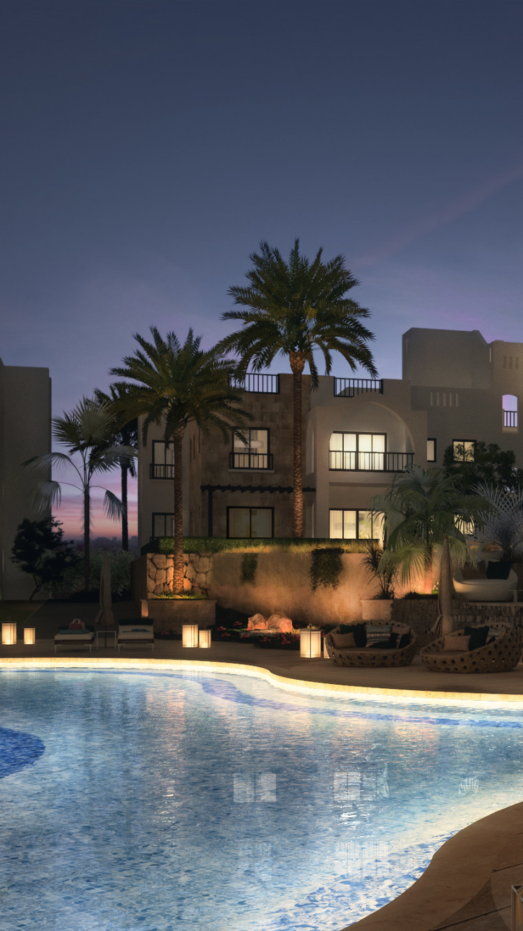 Swimming Pool Near Green Trees and Building During Night Time. Wallpaper in 750x1334 Resolution