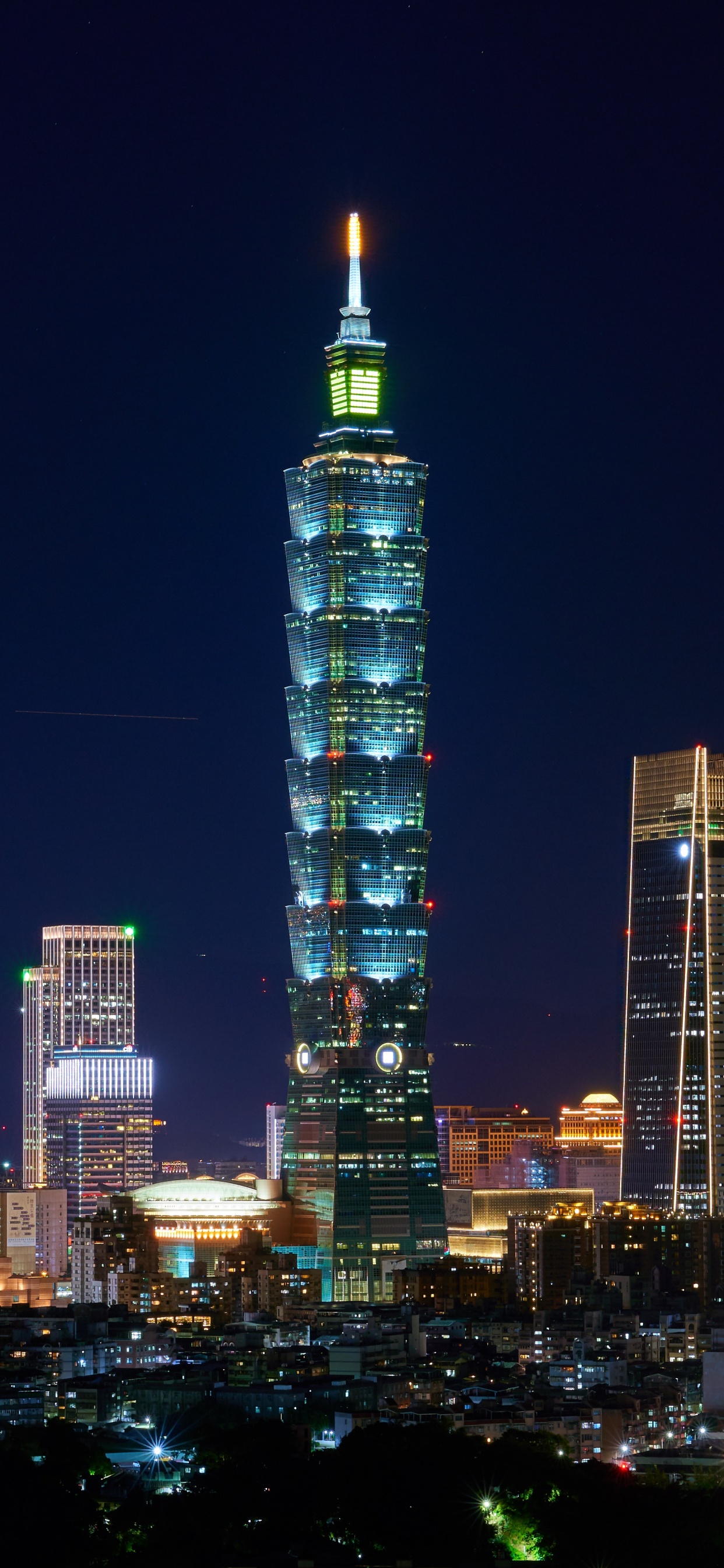 City Skyline During Night Time. Wallpaper in 1242x2688 Resolution