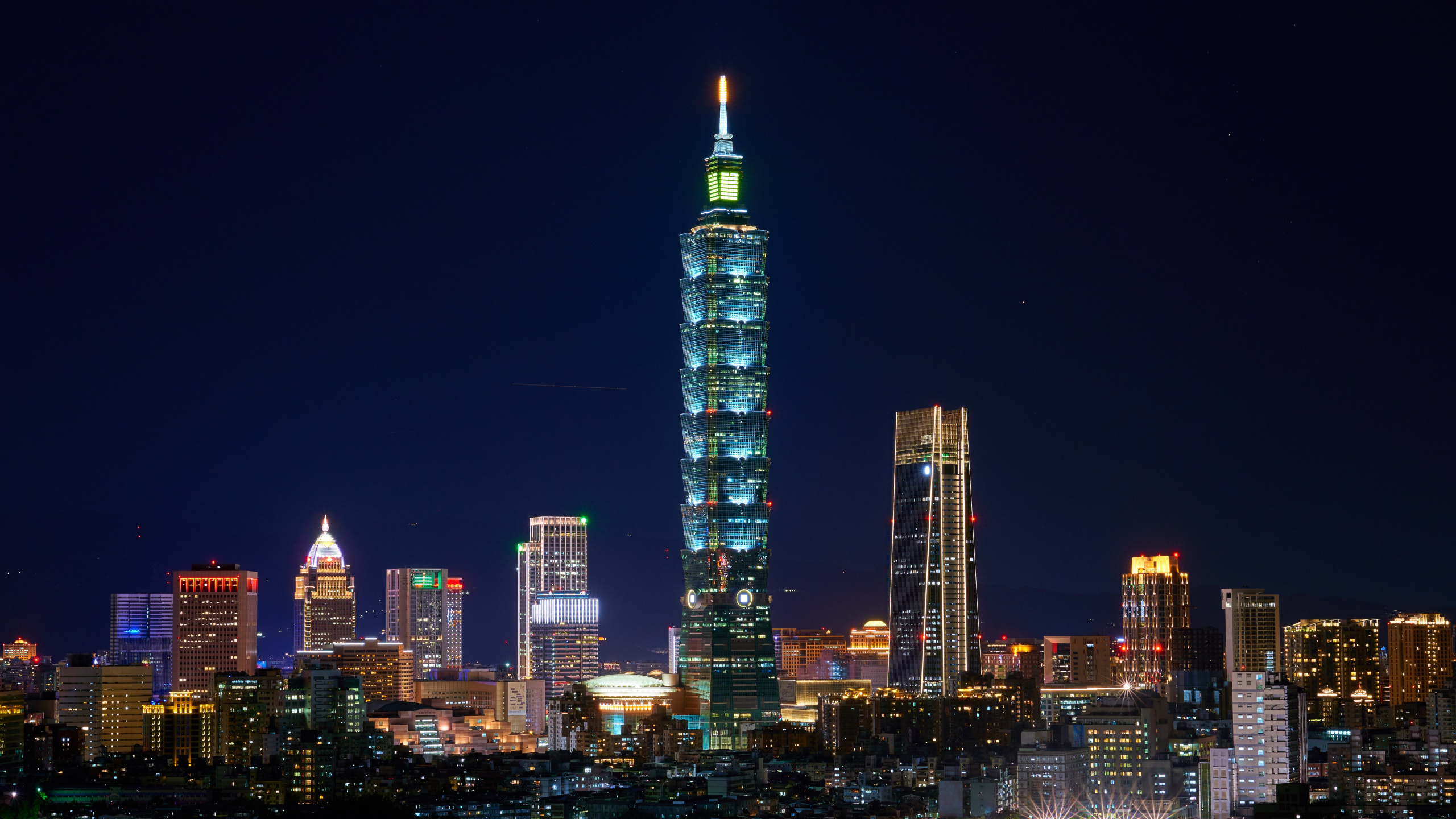 City Skyline During Night Time. Wallpaper in 2560x1440 Resolution