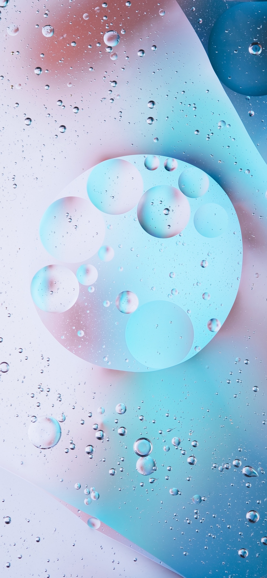 Red Round Plastic Ball Toys. Wallpaper in 1125x2436 Resolution