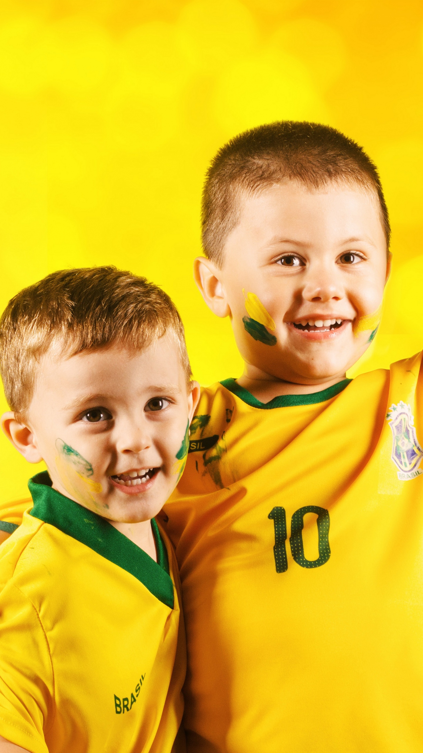 Boy in Yellow and Green Adidas Jacket. Wallpaper in 1440x2560 Resolution