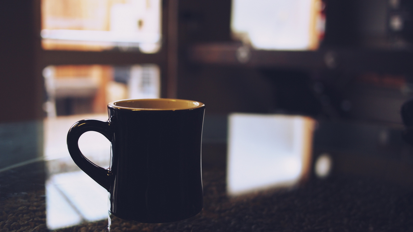 Black Ceramic Mug on Table. Wallpaper in 1366x768 Resolution