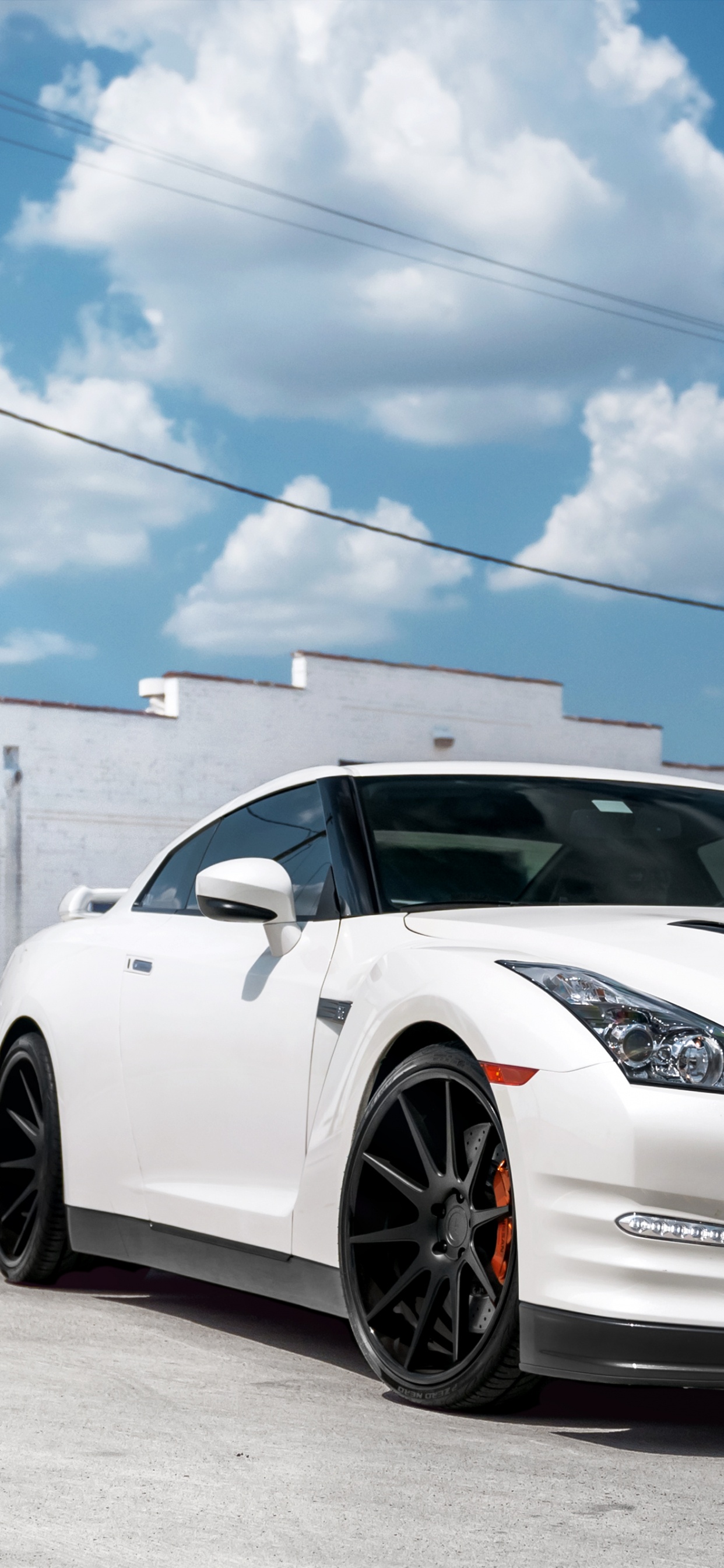 White Porsche 911 on Road During Daytime. Wallpaper in 1242x2688 Resolution