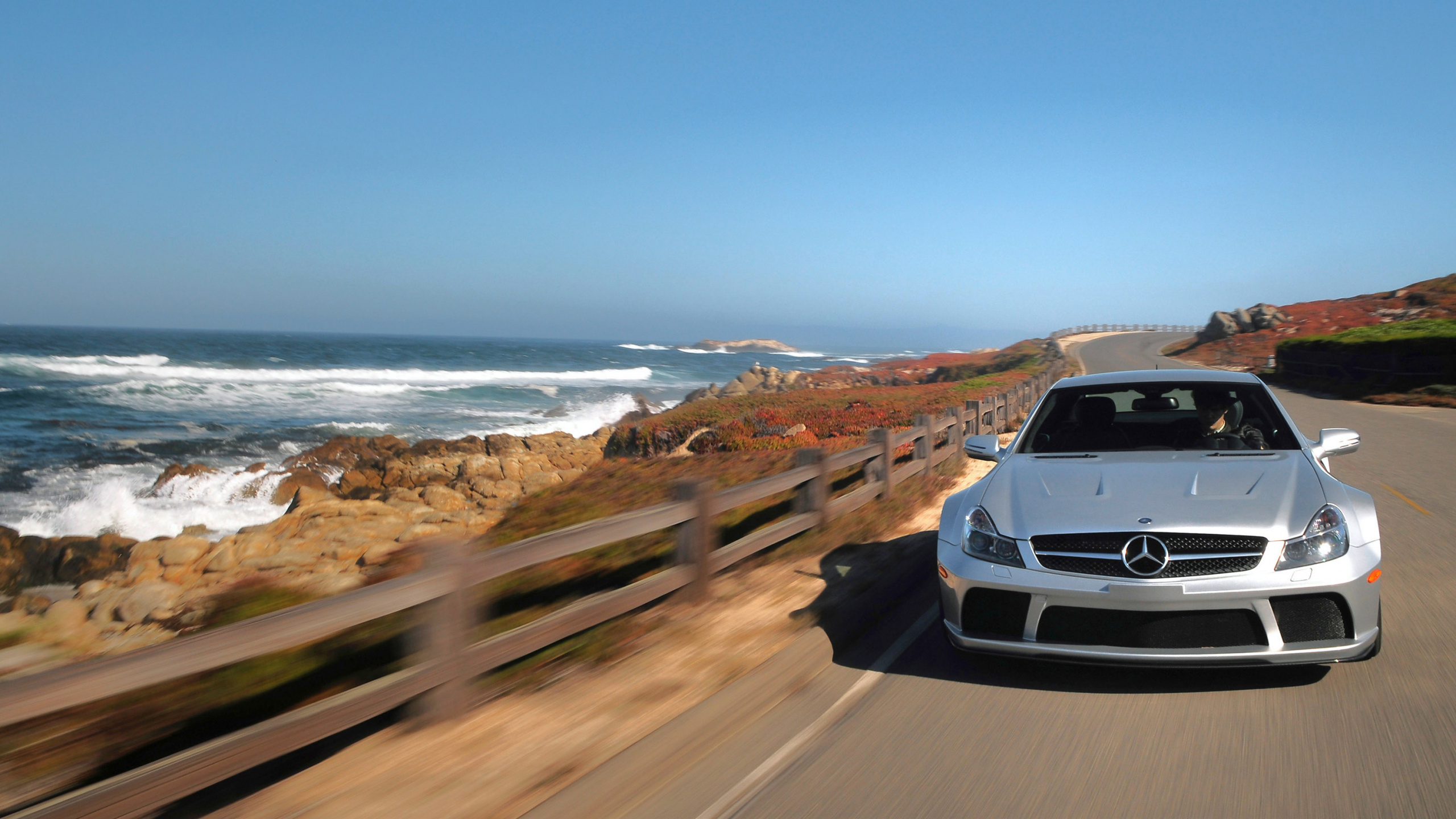 White Car on Road Near Sea During Daytime. Wallpaper in 2560x1440 Resolution
