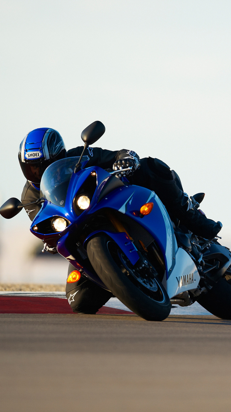 Blue and Black Sports Bike on Road During Daytime. Wallpaper in 750x1334 Resolution
