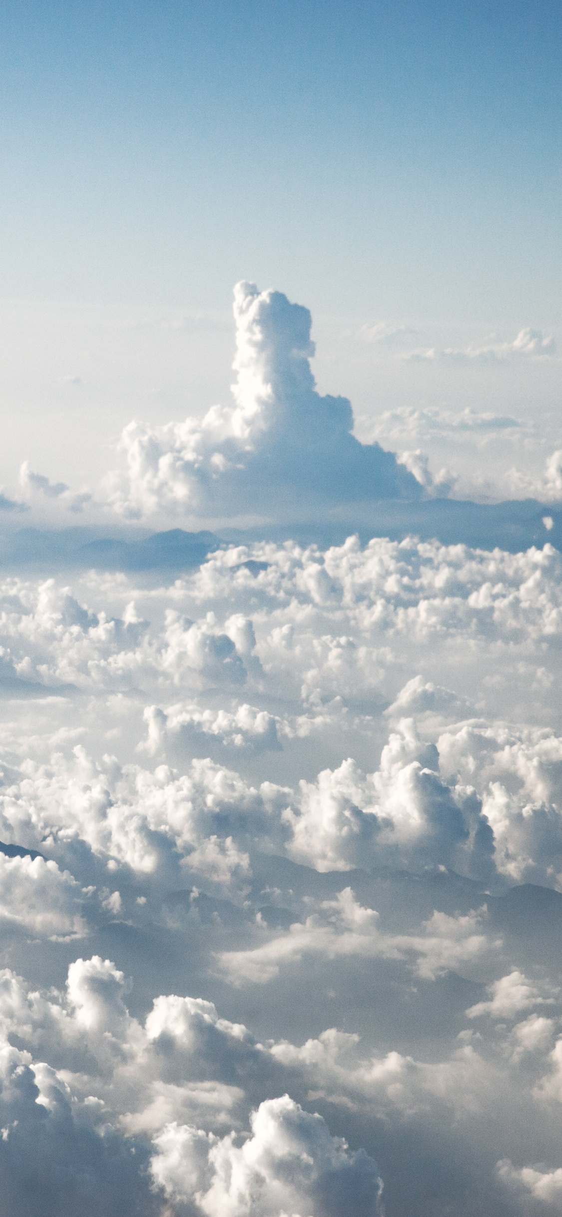 White Clouds and Blue Sky During Daytime. Wallpaper in 1125x2436 Resolution